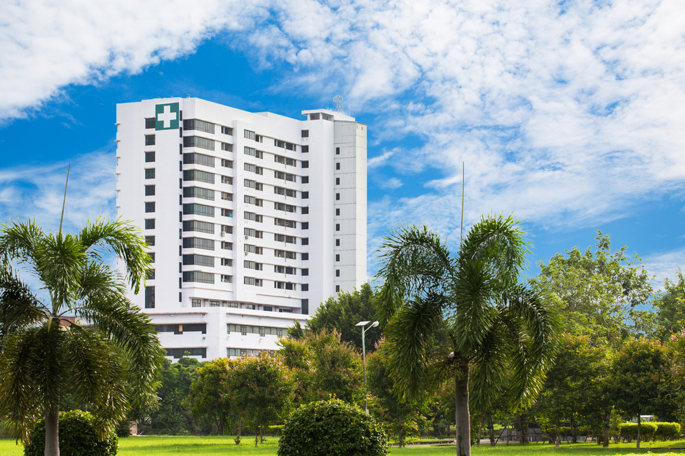 hospital building with trees and landscaping