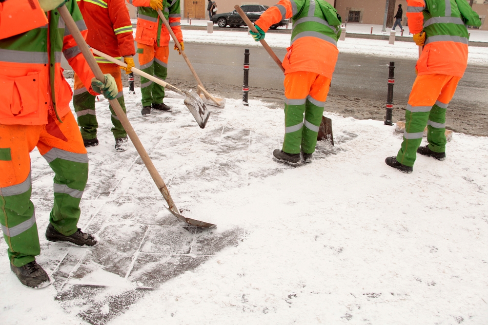 Crew shoveling snow