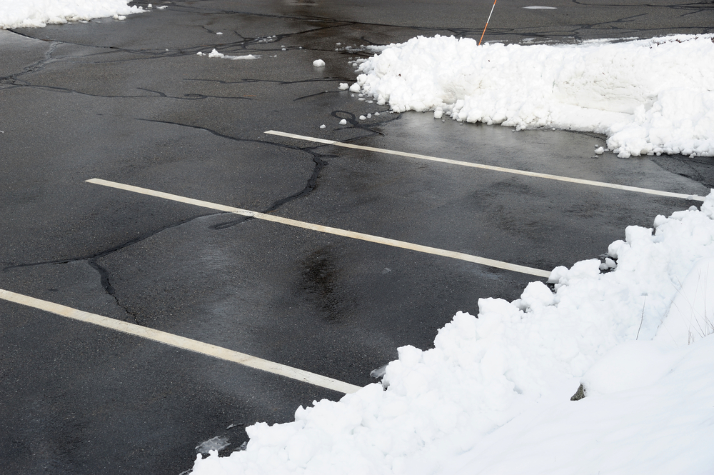 Empty parking lot with snow cleared